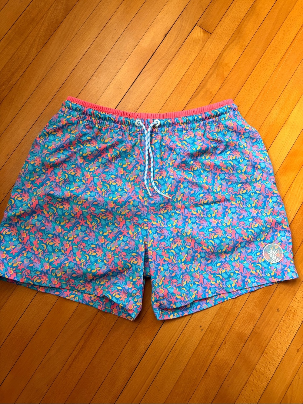 chubbies Pink and Blue Tropical Floral Swim Trunks